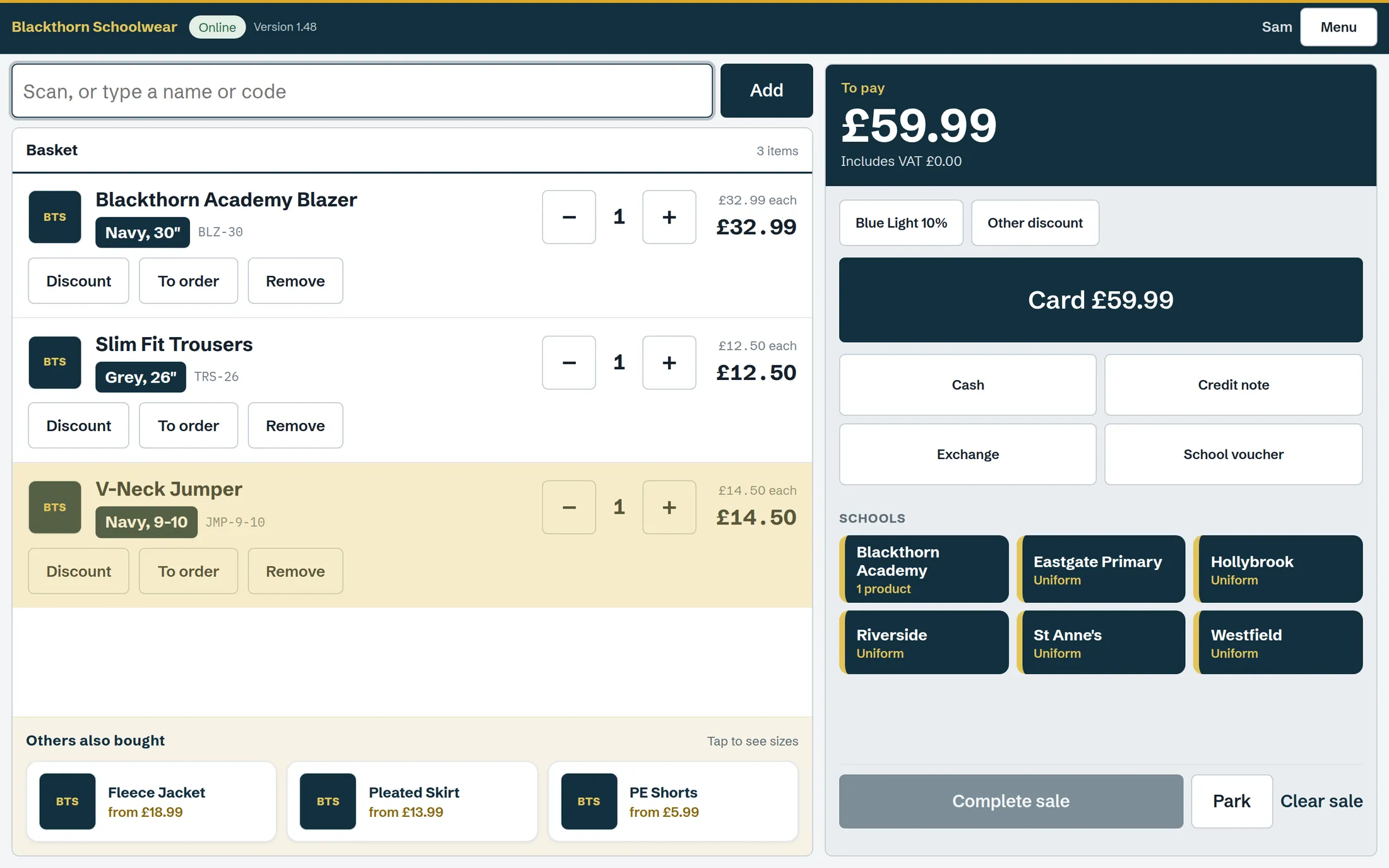 The shop till on demonstration data, with three items in the basket and buttons for each school